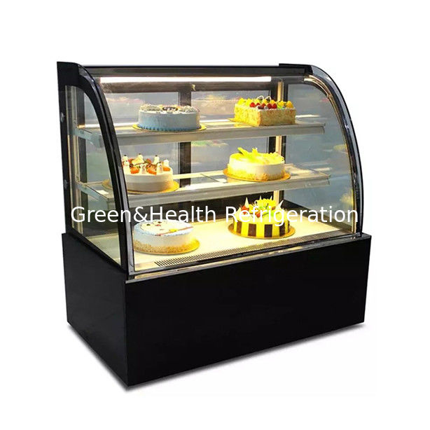 Gebogen glazen roestvrijstalen taartvitrinevriezer met meerdere schappen voor commercieel gebruik